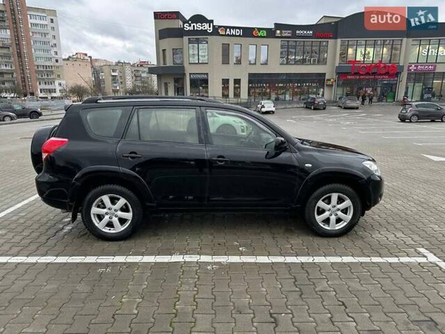Чорний Тойота РАВ 4, об'ємом двигуна 2.4 л та пробігом 254 тис. км за 12000 $, фото 1 на Automoto.ua