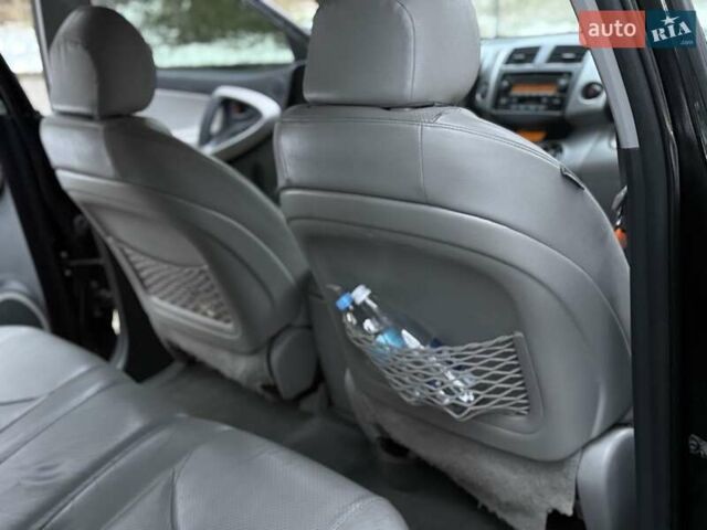 Черный Тойота РАВ 4, объемом двигателя 2.36 л и пробегом 267 тыс. км за 7777 $, фото 54 на Automoto.ua