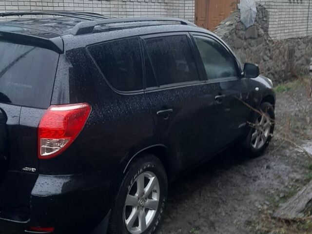 Черный Тойота РАВ 4, объемом двигателя 2.4 л и пробегом 317 тыс. км за 9500 $, фото 5 на Automoto.ua