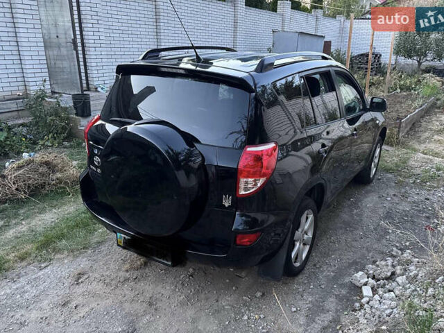 Черный Тойота РАВ 4, объемом двигателя 2 л и пробегом 151 тыс. км за 9800 $, фото 3 на Automoto.ua