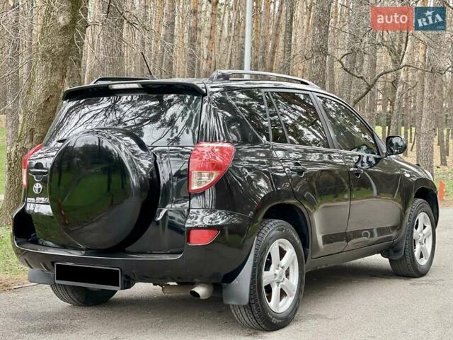 Черный Тойота РАВ 4, объемом двигателя 2 л и пробегом 176 тыс. км за 10450 $, фото 4 на Automoto.ua