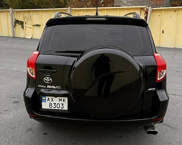 Черный Тойота РАВ 4, объемом двигателя 2.4 л и пробегом 268 тыс. км за 10500 $, фото 3 на Automoto.ua