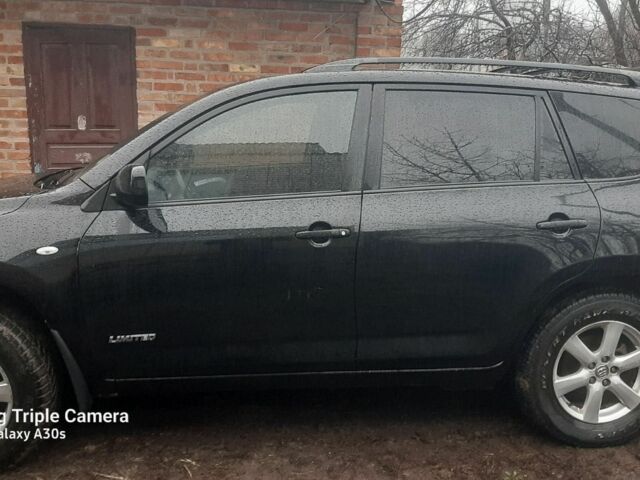 Черный Тойота РАВ 4, объемом двигателя 2.4 л и пробегом 317 тыс. км за 9500 $, фото 3 на Automoto.ua