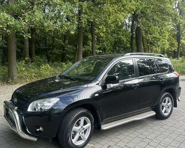 Черный Тойота РАВ 4, объемом двигателя 2.36 л и пробегом 107 тыс. км за 11900 $, фото 13 на Automoto.ua