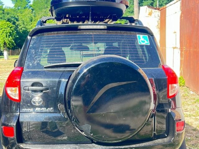 Черный Тойота РАВ 4, объемом двигателя 2 л и пробегом 150 тыс. км за 10500 $, фото 3 на Automoto.ua