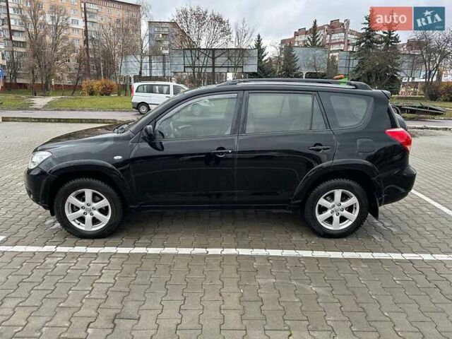Чорний Тойота РАВ 4, об'ємом двигуна 2.4 л та пробігом 254 тис. км за 12000 $, фото 3 на Automoto.ua