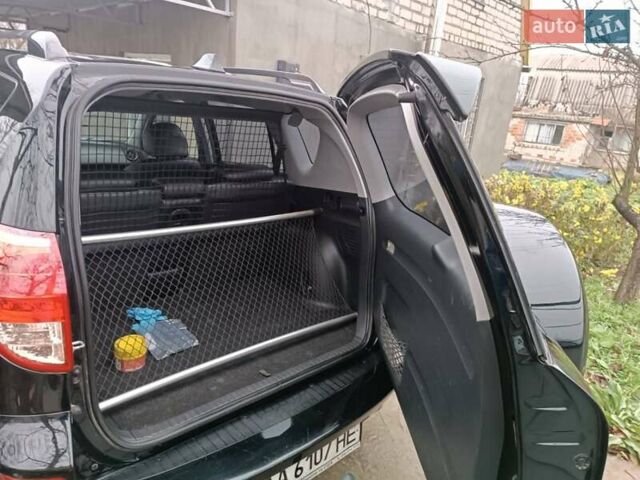 Чорний Тойота РАВ 4, об'ємом двигуна 2.36 л та пробігом 195 тис. км за 9500 $, фото 2 на Automoto.ua