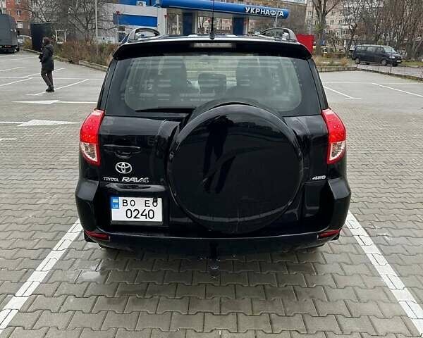 Чорний Тойота РАВ 4, об'ємом двигуна 2.4 л та пробігом 254 тис. км за 12000 $, фото 2 на Automoto.ua