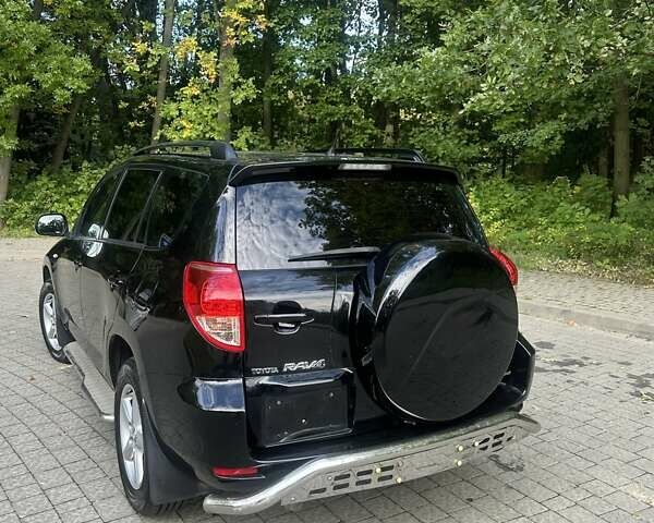 Черный Тойота РАВ 4, объемом двигателя 2.36 л и пробегом 107 тыс. км за 11900 $, фото 16 на Automoto.ua