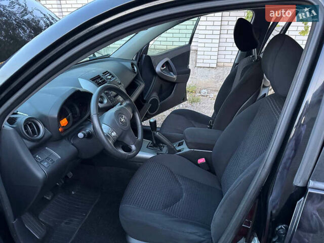 Черный Тойота РАВ 4, объемом двигателя 2 л и пробегом 151 тыс. км за 9800 $, фото 7 на Automoto.ua