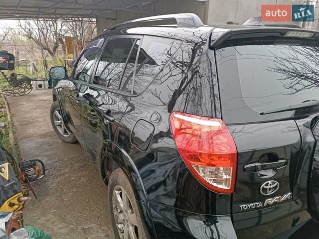 Чорний Тойота РАВ 4, об'ємом двигуна 2.36 л та пробігом 195 тис. км за 9500 $, фото 3 на Automoto.ua