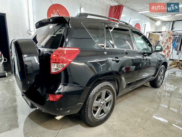 Чорний Тойота РАВ 4, об'ємом двигуна 2 л та пробігом 225 тис. км за 11650 $, фото 2 на Automoto.ua