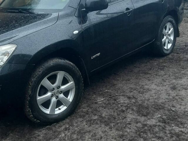 Черный Тойота РАВ 4, объемом двигателя 2.4 л и пробегом 317 тыс. км за 9500 $, фото 1 на Automoto.ua