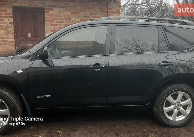 Черный Тойота РАВ 4, объемом двигателя 2.4 л и пробегом 317 тыс. км за 9500 $, фото 2 на Automoto.ua