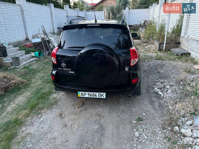 Черный Тойота РАВ 4, объемом двигателя 2 л и пробегом 151 тыс. км за 9800 $, фото 1 на Automoto.ua