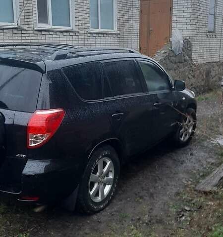 Черный Тойота РАВ 4, объемом двигателя 2.4 л и пробегом 317 тыс. км за 9500 $, фото 4 на Automoto.ua