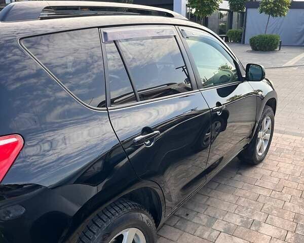 Черный Тойота РАВ 4, объемом двигателя 2 л и пробегом 180 тыс. км за 9700 $, фото 1 на Automoto.ua