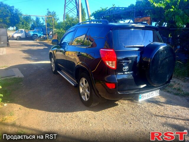 Чорний Тойота РАВ 4, об'ємом двигуна 2.4 л та пробігом 215 тис. км за 10800 $, фото 4 на Automoto.ua