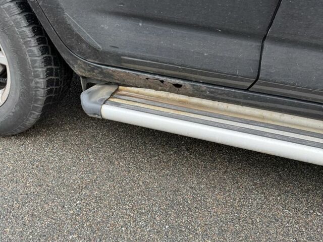 Черный Тойота РАВ 4, объемом двигателя 2 л и пробегом 230 тыс. км за 6800 $, фото 4 на Automoto.ua