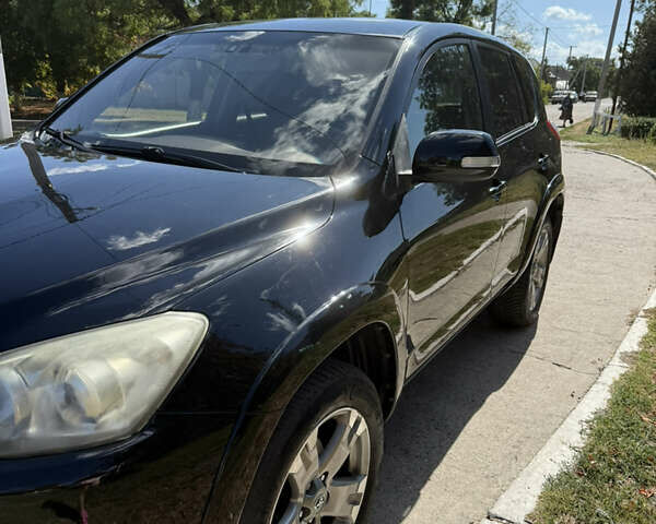 Черный Тойота РАВ 4, объемом двигателя 2.23 л и пробегом 275 тыс. км за 10000 $, фото 2 на Automoto.ua