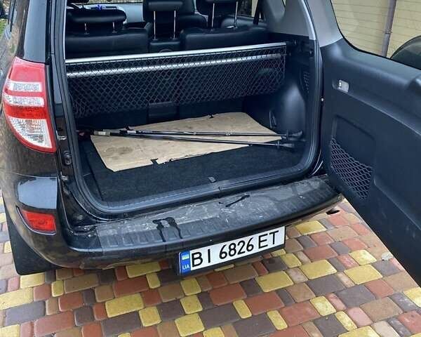 Черный Тойота РАВ 4, объемом двигателя 2 л и пробегом 224 тыс. км за 12500 $, фото 3 на Automoto.ua