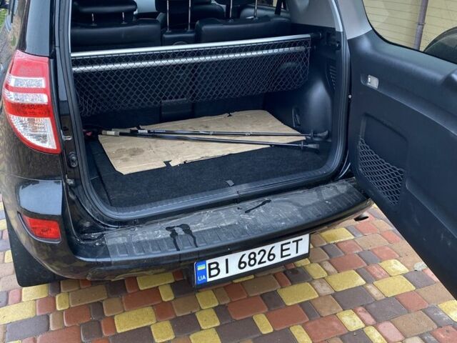 Черный Тойота РАВ 4, объемом двигателя 2 л и пробегом 224 тыс. км за 12500 $, фото 4 на Automoto.ua