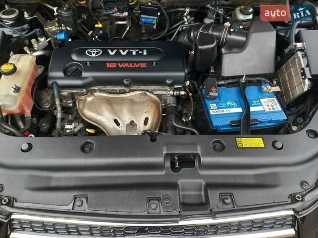 Чорний Тойота РАВ 4, об'ємом двигуна 2.36 л та пробігом 241 тис. км за 13600 $, фото 25 на Automoto.ua