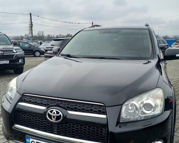 Чорний Тойота РАВ 4, об'ємом двигуна 2.36 л та пробігом 241 тис. км за 13600 $, фото 1 на Automoto.ua