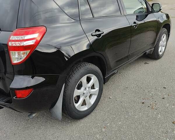 Черный Тойота РАВ 4, объемом двигателя 2 л и пробегом 120 тыс. км за 16000 $, фото 2 на Automoto.ua