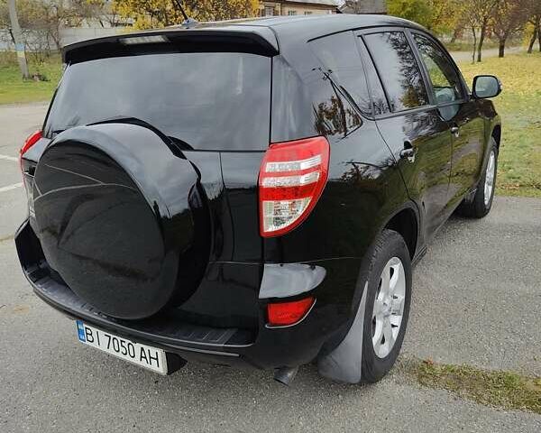 Черный Тойота РАВ 4, объемом двигателя 2 л и пробегом 120 тыс. км за 16000 $, фото 3 на Automoto.ua