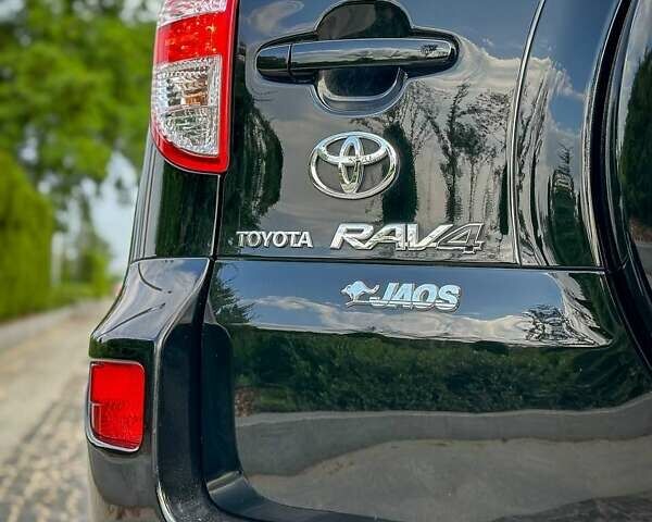 Чорний Тойота РАВ 4, об'ємом двигуна 2 л та пробігом 210 тис. км за 12500 $, фото 54 на Automoto.ua