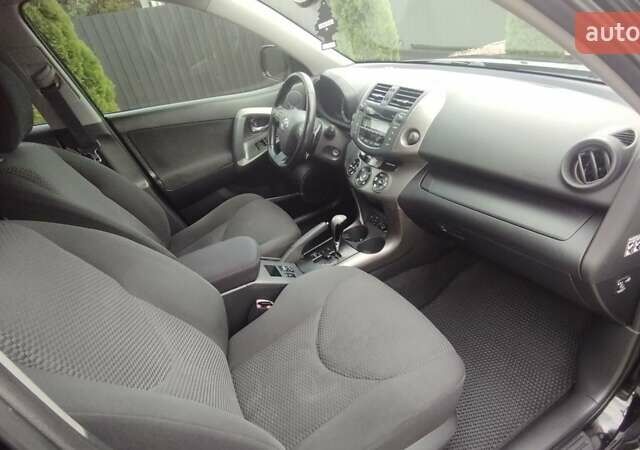 Чорний Тойота РАВ 4, об'ємом двигуна 2 л та пробігом 184 тис. км за 12500 $, фото 19 на Automoto.ua