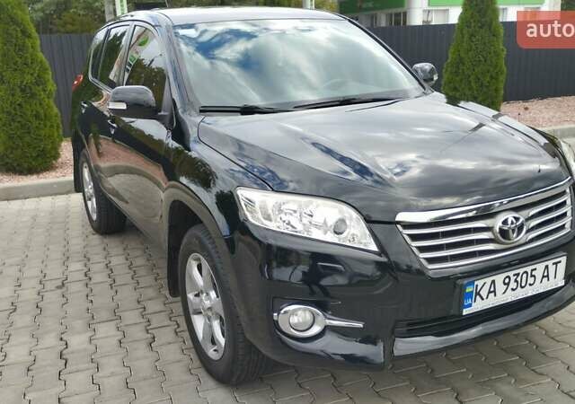 Чорний Тойота РАВ 4, об'ємом двигуна 2 л та пробігом 184 тис. км за 12500 $, фото 1 на Automoto.ua