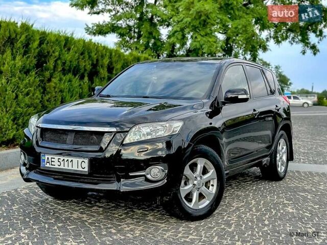 Чорний Тойота РАВ 4, об'ємом двигуна 2 л та пробігом 210 тис. км за 12500 $, фото 60 на Automoto.ua