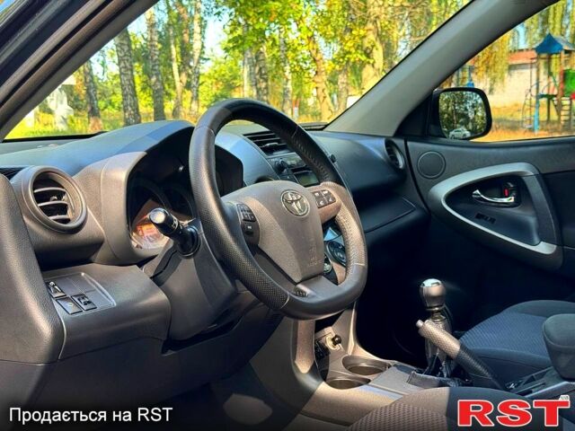 Черный Тойота РАВ 4, объемом двигателя 2 л и пробегом 152 тыс. км за 12100 $, фото 5 на Automoto.ua