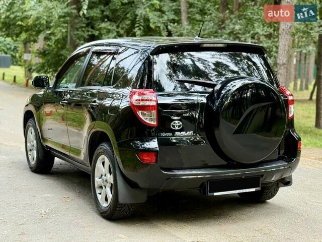 Чорний Тойота РАВ 4, об'ємом двигуна 2 л та пробігом 153 тис. км за 12999 $, фото 6 на Automoto.ua