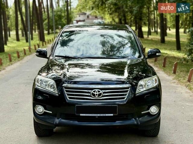Чорний Тойота РАВ 4, об'ємом двигуна 2 л та пробігом 153 тис. км за 12999 $, фото 1 на Automoto.ua