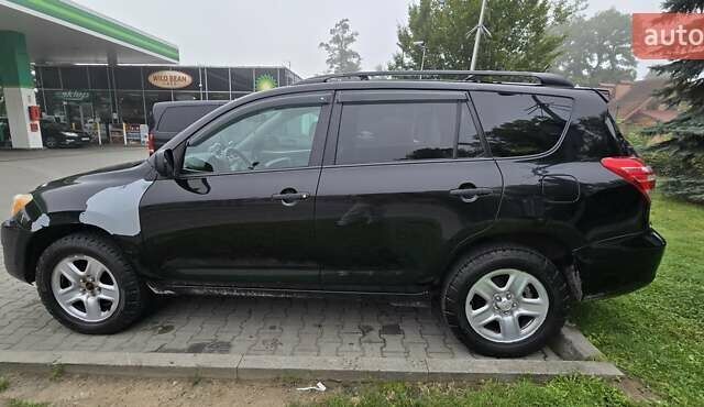 Черный Тойота РАВ 4, объемом двигателя 2.49 л и пробегом 160 тыс. км за 12500 $, фото 1 на Automoto.ua