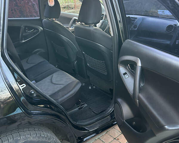 Черный Тойота РАВ 4, объемом двигателя 2 л и пробегом 122 тыс. км за 13700 $, фото 19 на Automoto.ua