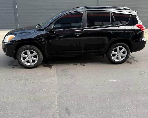 Черный Тойота РАВ 4, объемом двигателя 2.49 л и пробегом 212 тыс. км за 11200 $, фото 2 на Automoto.ua