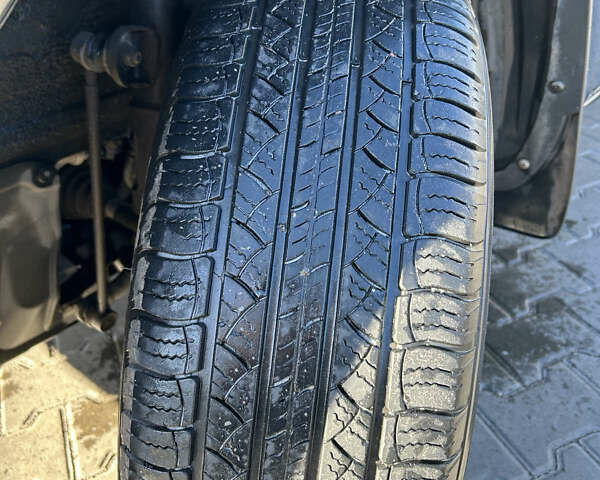 Черный Тойота РАВ 4, объемом двигателя 2 л и пробегом 122 тыс. км за 13700 $, фото 1 на Automoto.ua