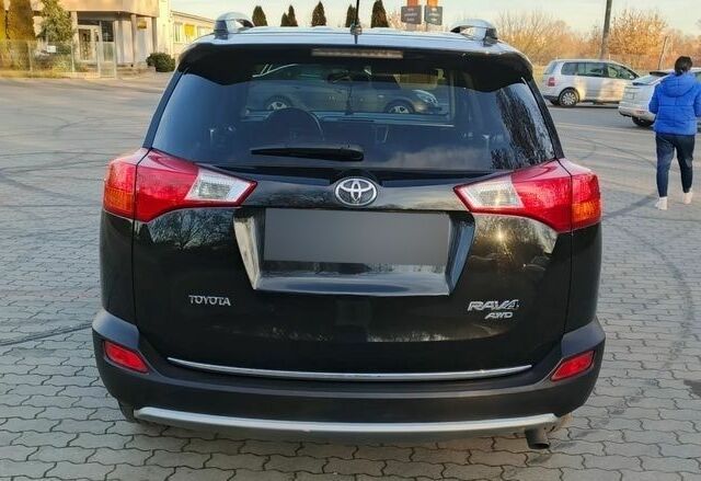 Черный Тойота РАВ 4, объемом двигателя 2 л и пробегом 218 тыс. км за 8400 $, фото 5 на Automoto.ua