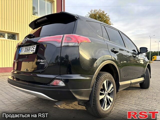 Тойота РАВ 4 2015 у Гадяче на Automoto.ua Чорний Тойота РАВ 4, об'ємом двигуна 2 л та пробігом 210 тис. км за 14300 $, фото 5 на Automoto.ua