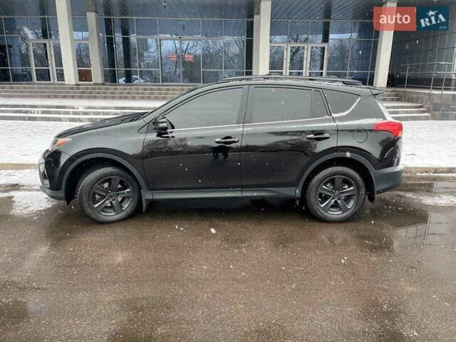 Черный Тойота РАВ 4, объемом двигателя 2.49 л и пробегом 196 тыс. км за 18000 $, фото 1 на Automoto.ua
