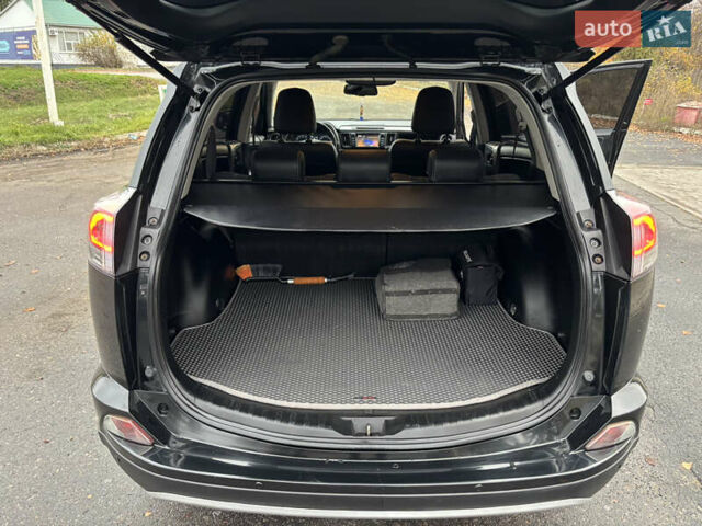 Черный Тойота РАВ 4, объемом двигателя 2 л и пробегом 365 тыс. км за 14500 $, фото 18 на Automoto.ua