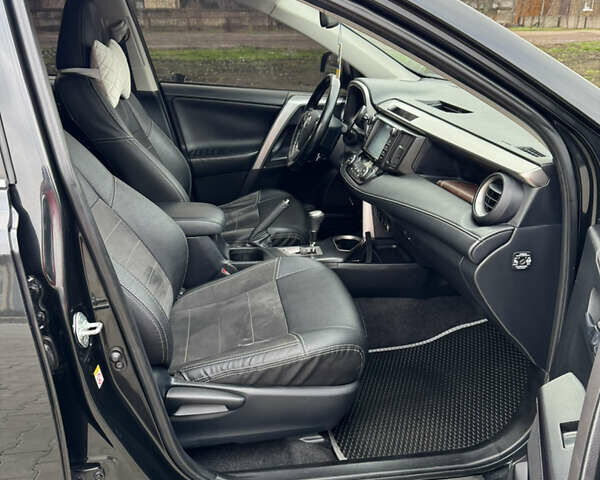 Чорний Тойота РАВ 4, об'ємом двигуна 2 л та пробігом 371 тис. км за 14755 $, фото 11 на Automoto.ua