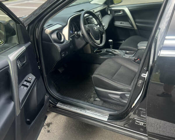 Чорний Тойота РАВ 4, об'ємом двигуна 2 л та пробігом 130 тис. км за 15400 $, фото 7 на Automoto.ua