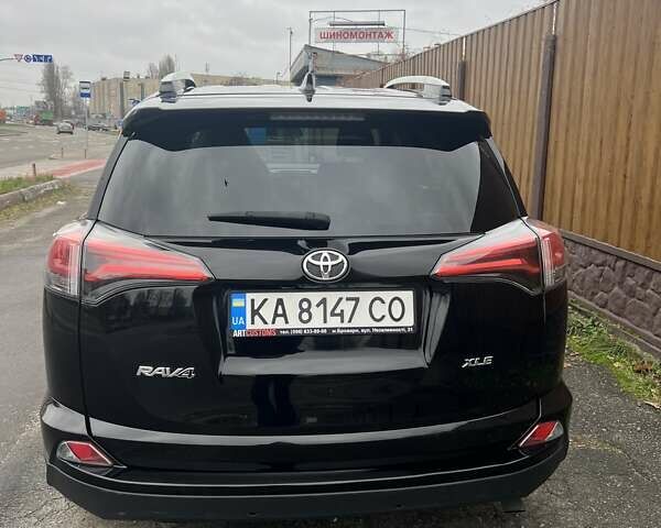Черный Тойота РАВ 4, объемом двигателя 2.49 л и пробегом 172 тыс. км за 16750 $, фото 2 на Automoto.ua