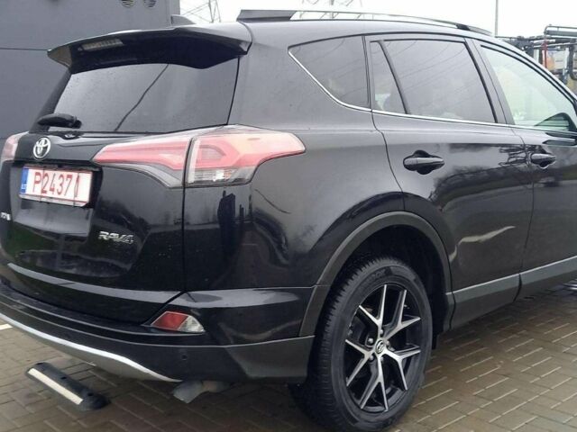 Черный Тойота РАВ 4, объемом двигателя 2 л и пробегом 128 тыс. км за 9100 $, фото 6 на Automoto.ua