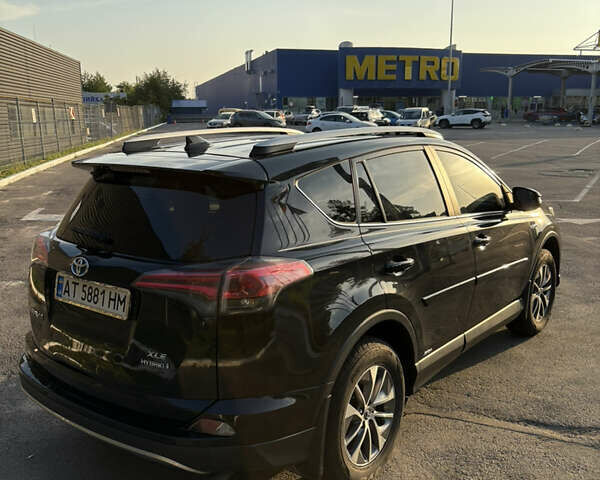 Черный Тойота РАВ 4, объемом двигателя 2.49 л и пробегом 99 тыс. км за 23000 $, фото 3 на Automoto.ua
